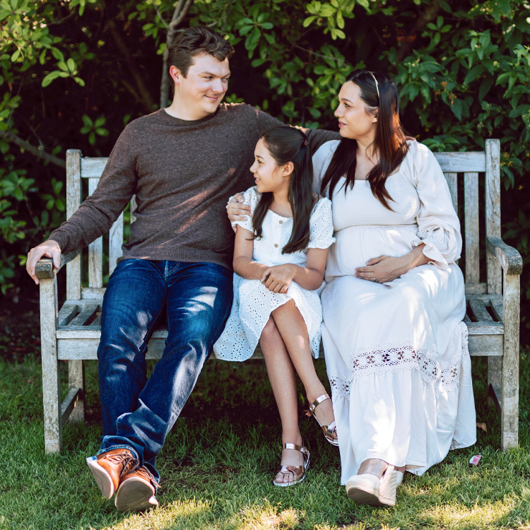 Family on park bench