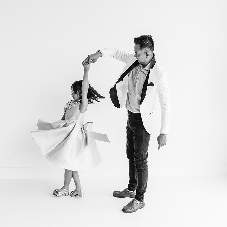 Dad and daughter dancing