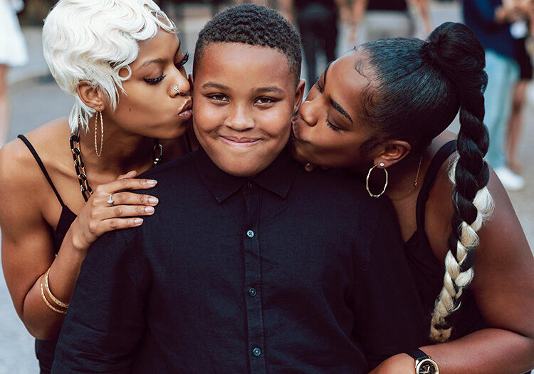 Mom and daughter with son
